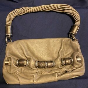 Michael Kors handbag. Leather with metallic accents.